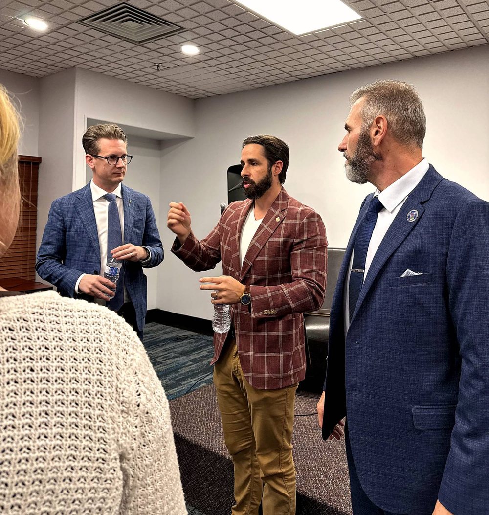 Cole Kander with Minister Nate Glubish and Stacy Miskew